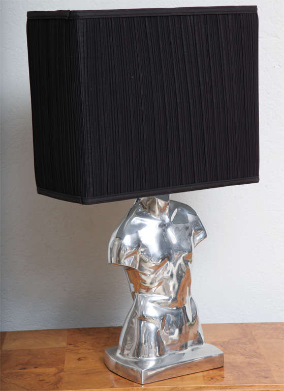 Handsome, polished aluminum male torso lamp... a classical form in modern materials. (Shade not included.)