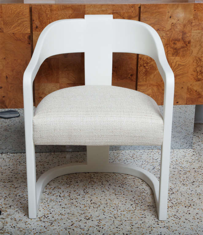 These Karl Springer Onassis chairs have the most beguiling eggshell, gesso  finish... you'll be drawn to reach out and touch them (and they feel as good as they look). A creamy off-white frame with neutral nubby silk upholstery. Fabulous desk