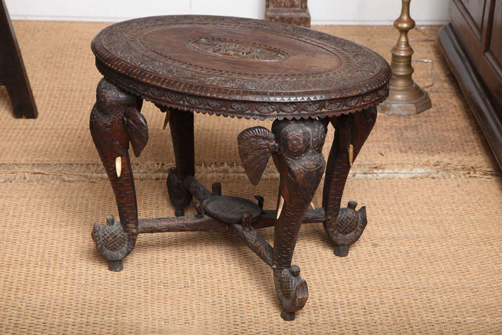 Carved elephant head legs with carved top