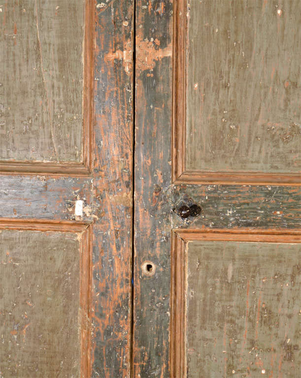 pair of Italian wood painted doors.  Door surround has been sold In Distressed Condition In Houston, TX