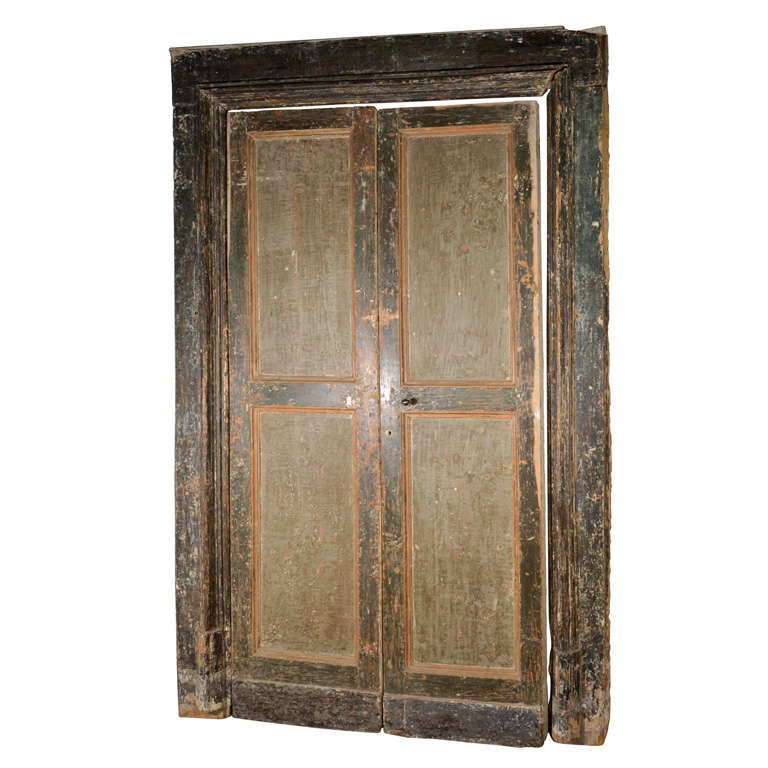 pair of Italian wood painted doors.  Door surround has been sold