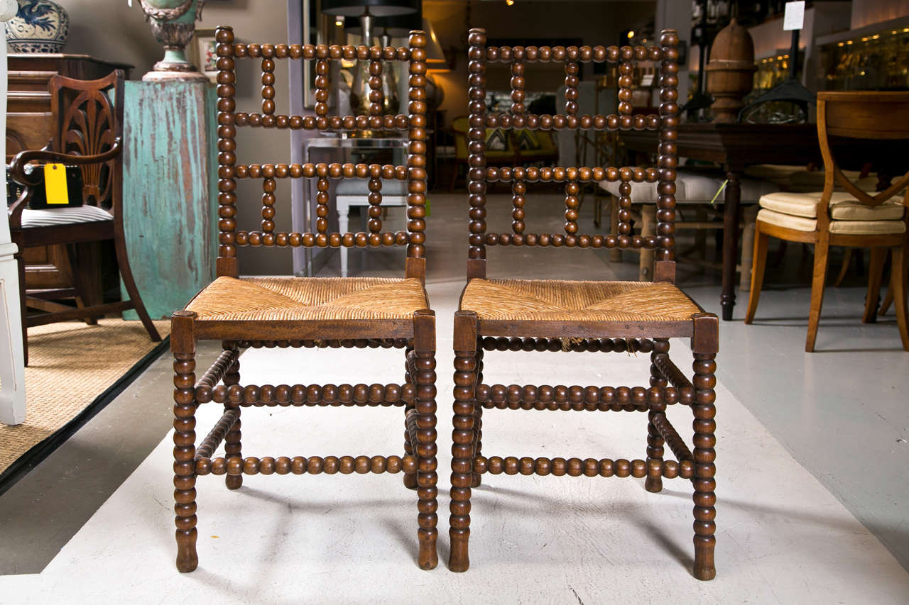 set of Eight 19th c English bobbin Chairs with Rush Seat