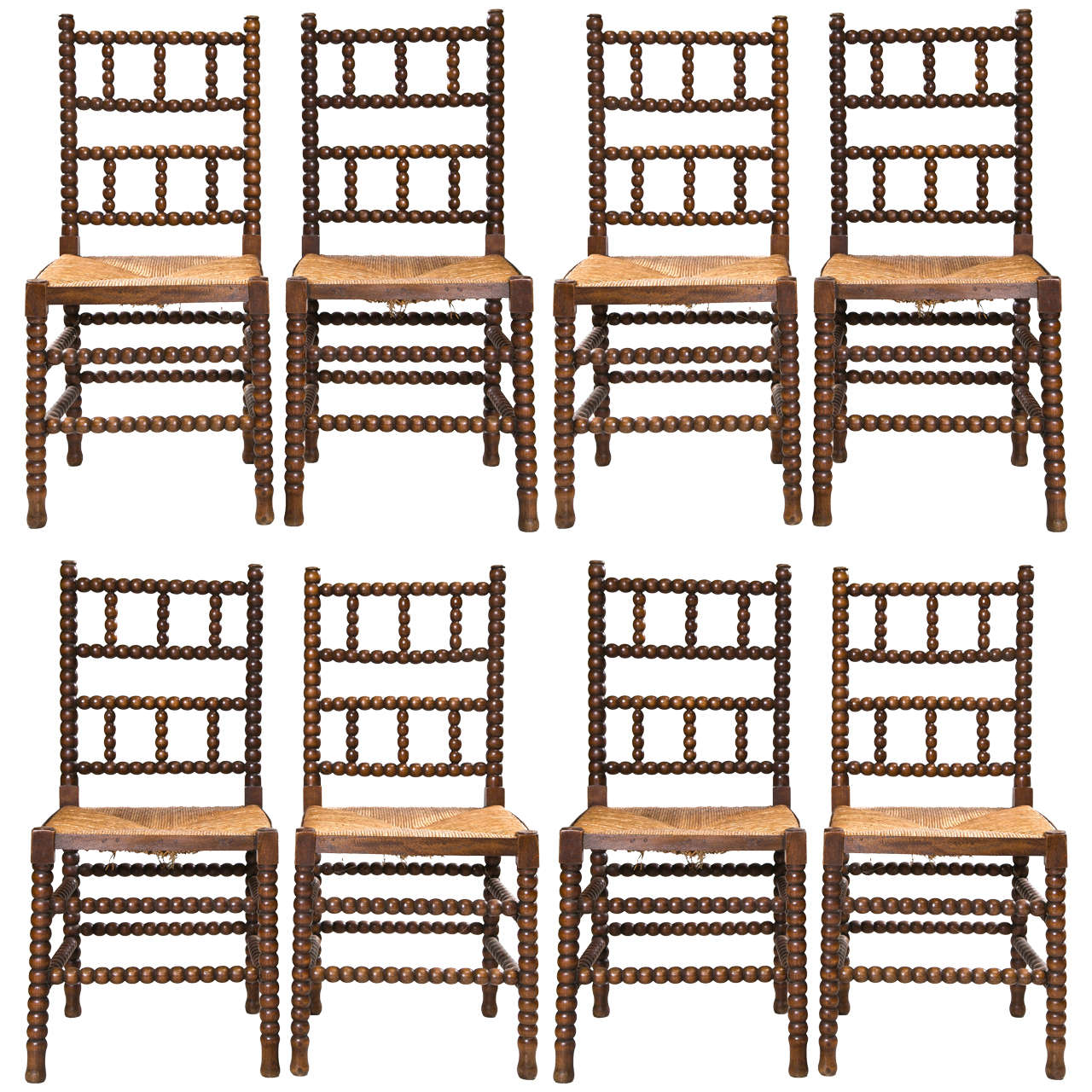 Set of Eight 19th Century English Bobbin Chairs with Rush Seat