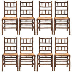 Set of Eight 19th Century English Bobbin Chairs with Rush Seat
