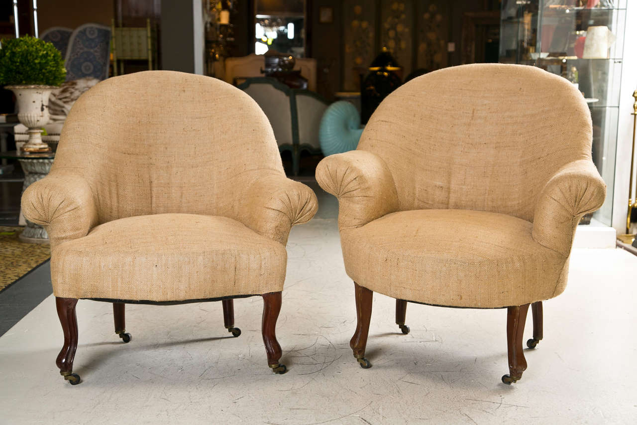 19th C English slipper chairs covered in burlap.  The chairs are close to identical and work well with one another in the same room, but the are not a matching pair

1550 pair
800 each