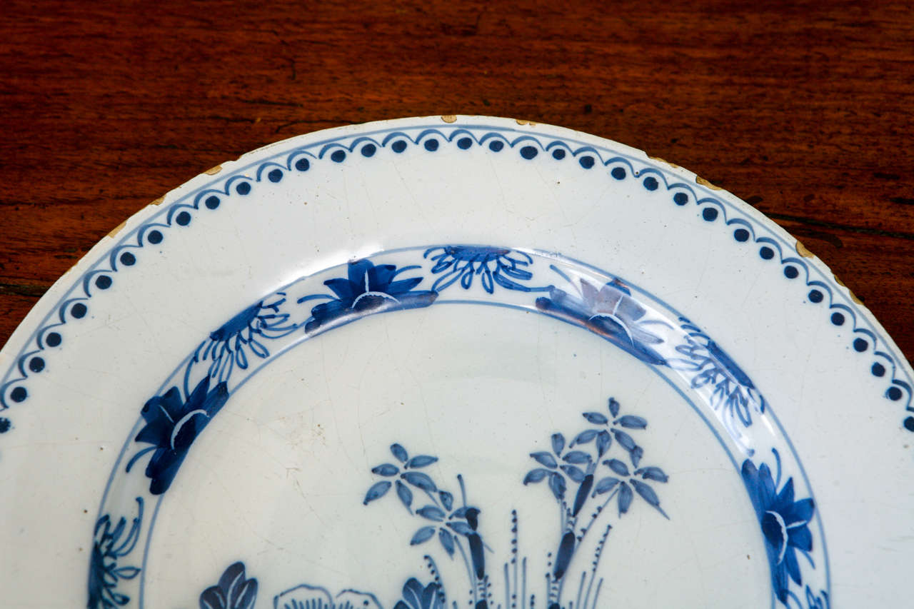A Dutch Delft Plate with Flowers, 18th Century 1