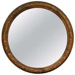 An Italian Carved and Gilt Wood Large Round Mirror, 18th c.