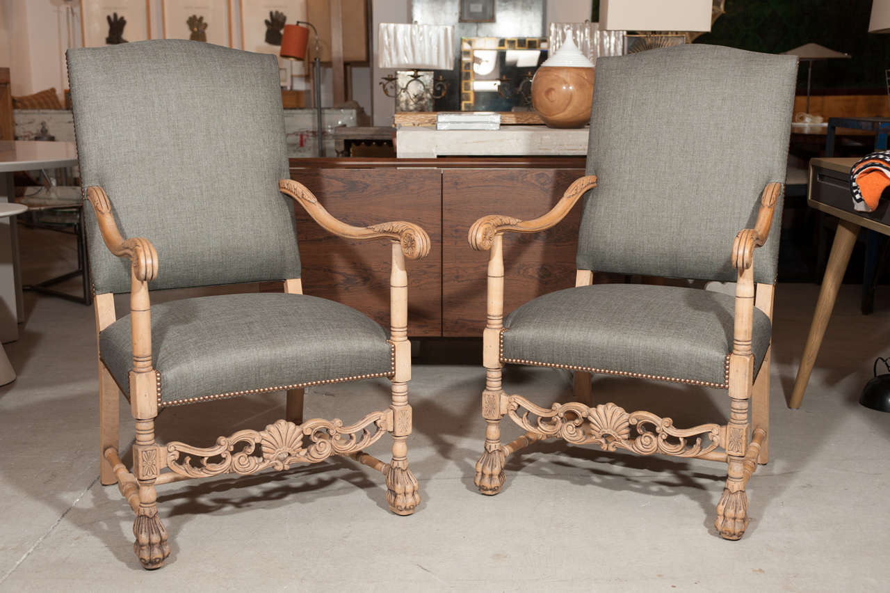 Pair of 19th century carved walnut Flemish armchairs.
Bare walnut finish and re-upholstery in grey linen.