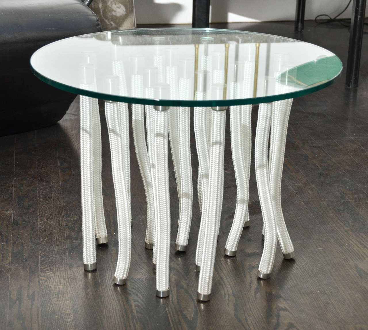 Round glass coffee table by Fabio Novembre.