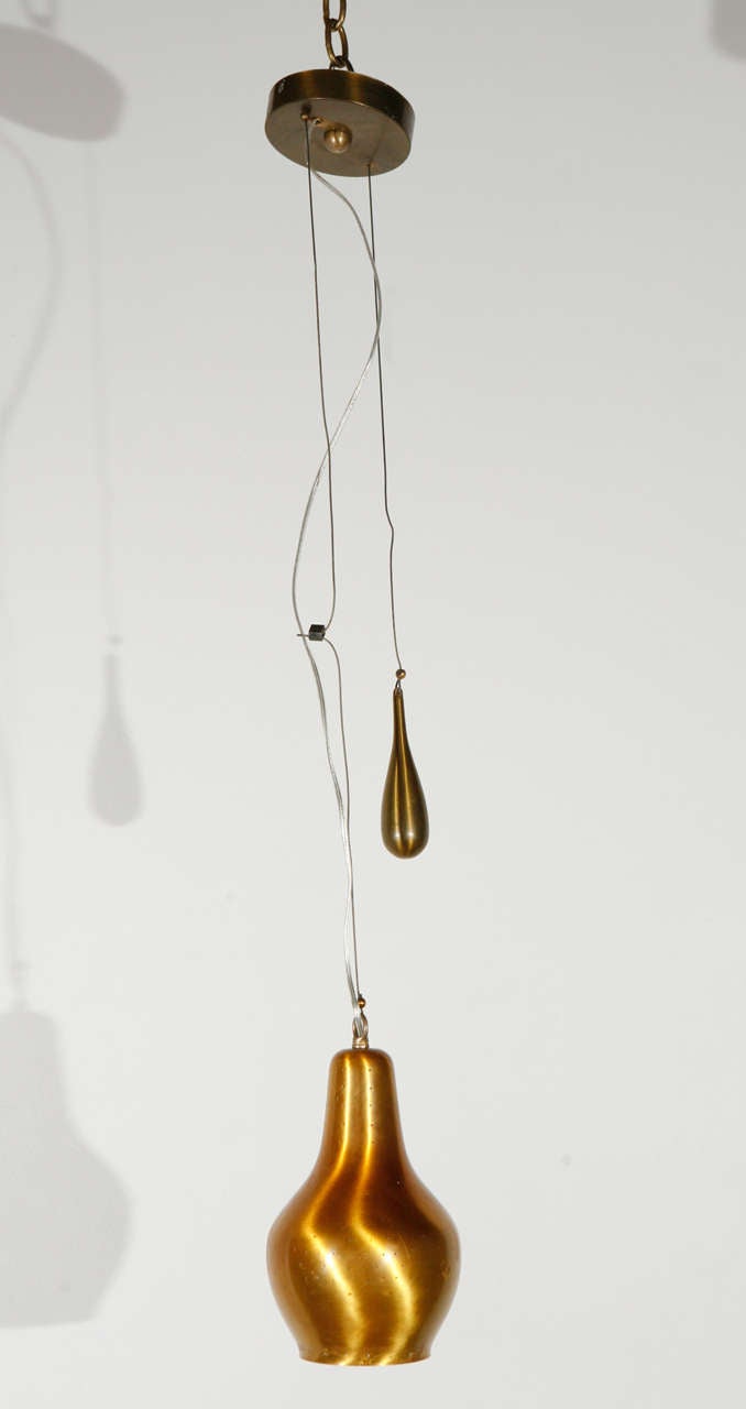 Paavo Tynell counterweight pendant.