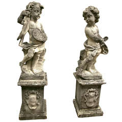 Pair of Cast Limestone Putti  and Pedestals