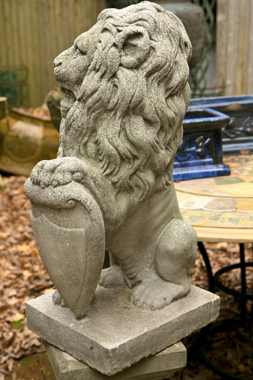 American Pair  Seated  Cast Concrete Lions with Shields For Sale