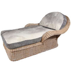 Rattan Chaise with Cowhide upholstery