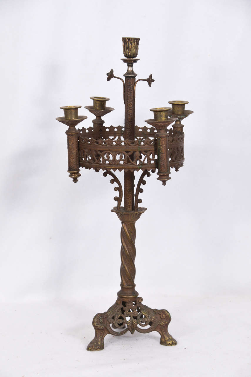 Medieval style, bronze, candelabrum, made in late to early 1800s, in Europe, cast bronze base and candleholders, five candleholders. Couls be made into a fabulous pair of table lamps.