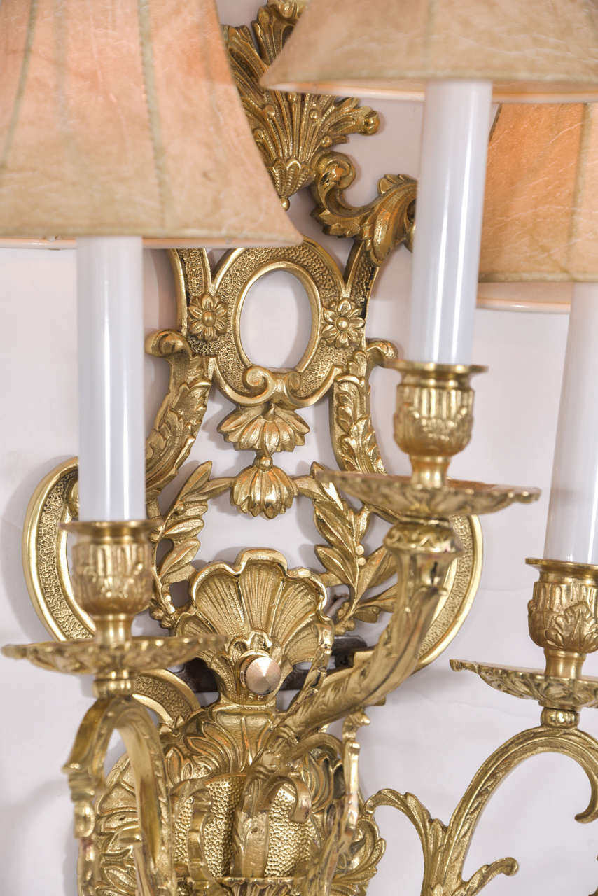 Mid-20th Century French, Polished Brass Three-Light Sconces with Floral Motif