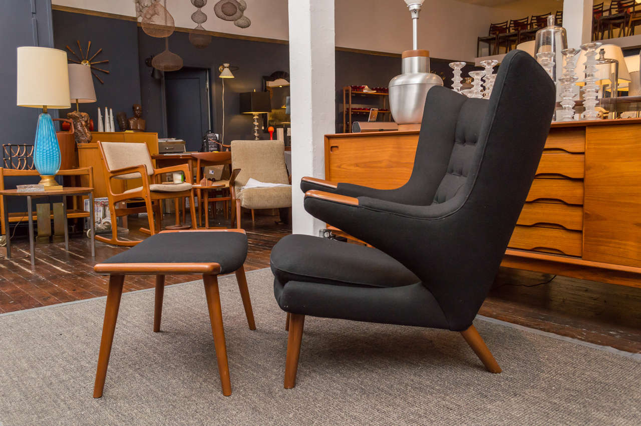 Simply the most comfortable chair ever, designed by Hans J Wegner for A.P. Stolen.
Made in Denmark, fully stamped and labeled.
Chair and ottoman are perfectly refinished and professionally upholstered in Danish black wool.
Matching original