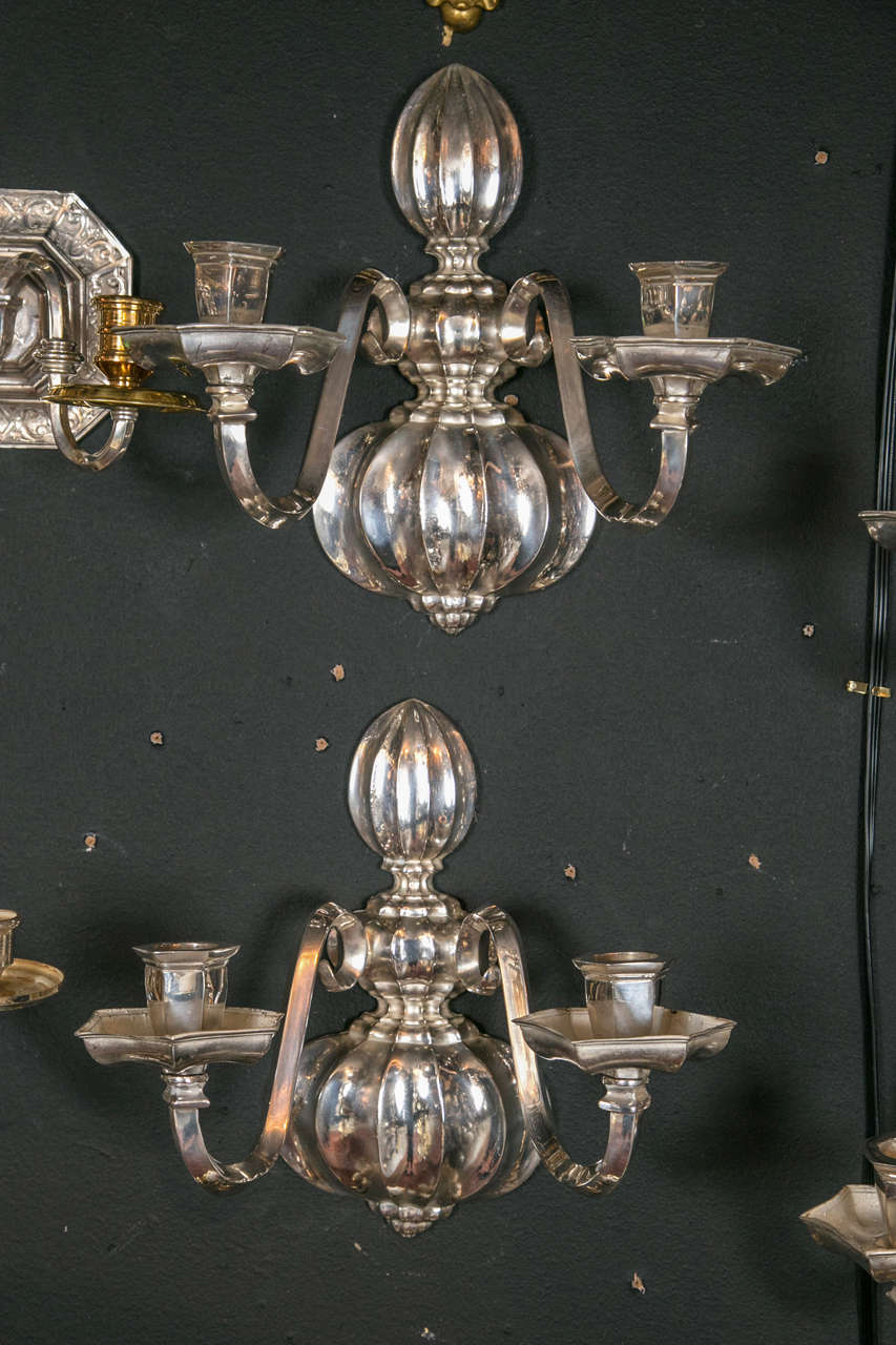 A pair of Caldwell silverplated sconces, circa 1920. Twelve available, Sold per pair.