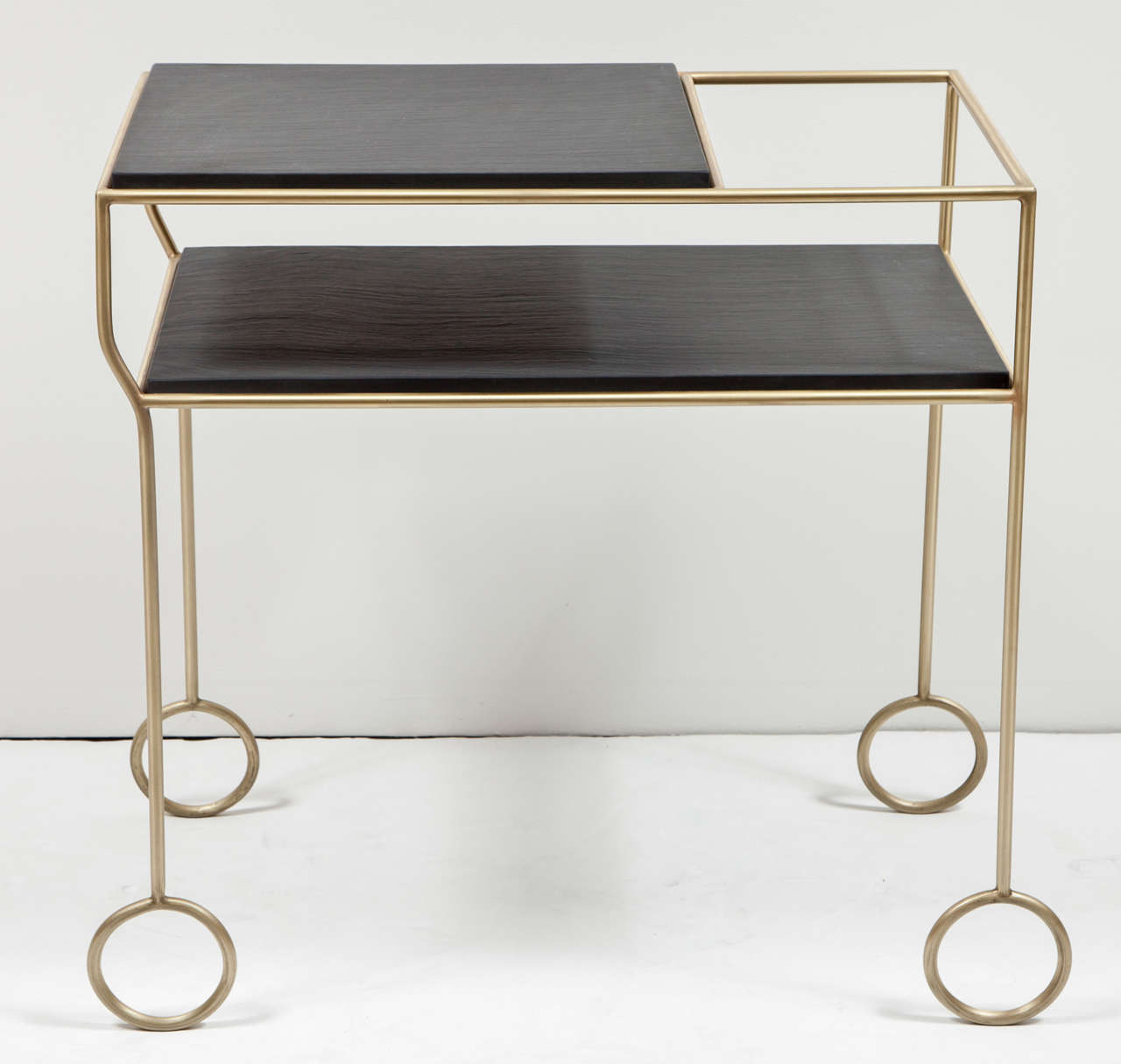Biron satin brass frame bar cart with natural cleft finish slate tops.