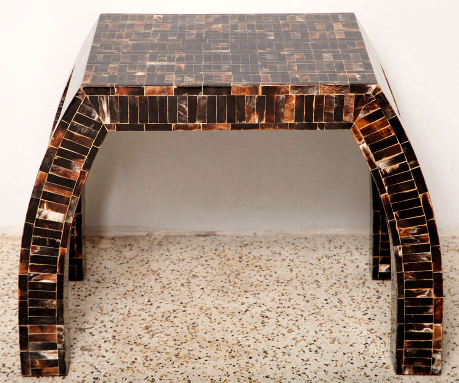 Fine quality craftsmanship shows in this gorgeous, 80's horn tile table, manufactured in Colombia for Enriques Garces. Its generous scale lends itself well to serving as either a side/end table or as a taller European-style coffee table.