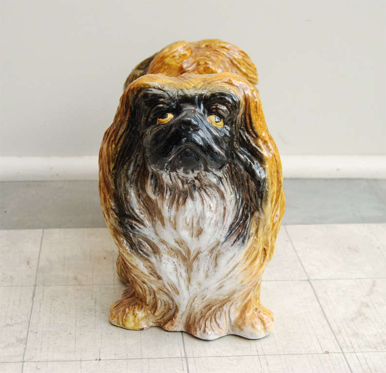 glazed terra cotta sculpture of a pekingese<br />
beautiful color and detail<br />
signed and dated:  hoffman 1932