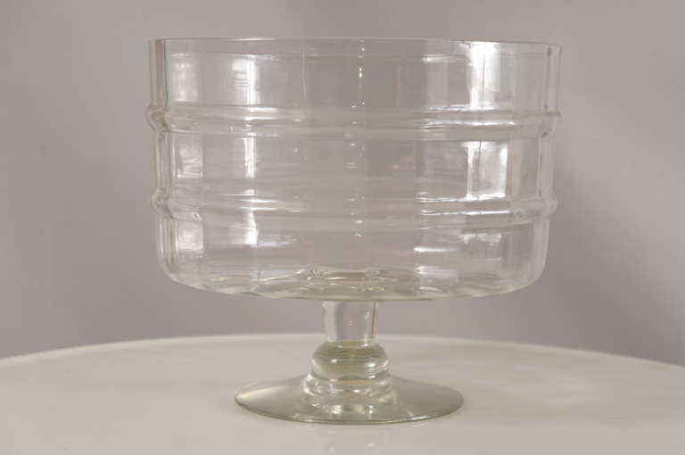 Impressive clear glass footed bowl. Over-scaled elegant tureen with striated vertical line design. 