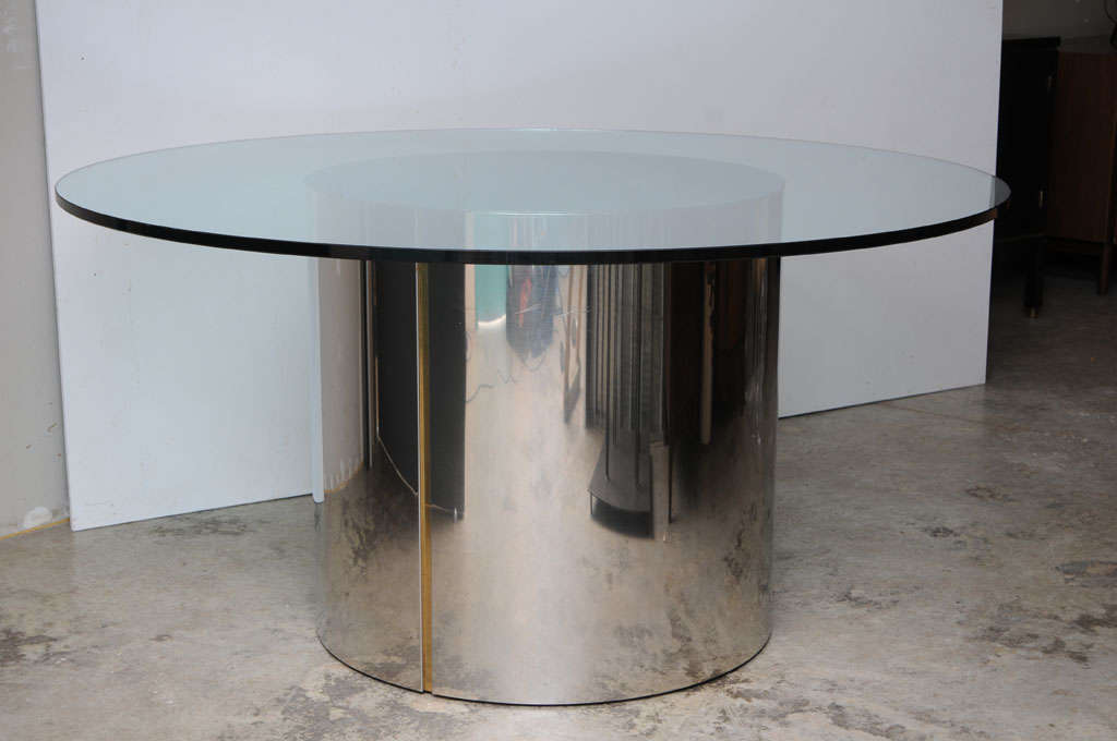 Dining room table by Pace Collection
Featuring 30" diameter steel base in mirror 
Finish with two brass reveals. 
Shown with 60"glass top, but designed for 72" dia
With a 30" dia steel top plate securing 
Glass to the