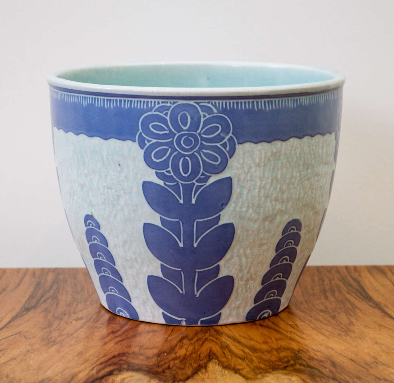 an Art Nuevo Pot by Gustavsberg. Stylized botanical decoration in shades of blue. 1919, marked.
