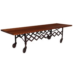High Rolling Accordion Coffee Table with Substantial Solid Dark Oak Surface
