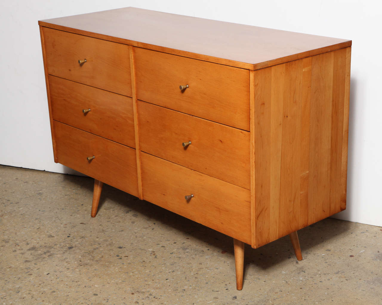 1950's 6 drawer double Planner Group Dresser by Paul McCobb for Winchendon Furniture.  With original Hourglass Brass pulls and tapered dowel legs.  Refinished