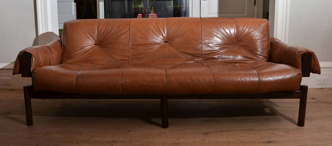 1960's Brazilian Percival Lafer caramel / cognac  leather sofa with beautiful  jacaranda wood frame and chrome details. Original leather upholstery with beautiful patina