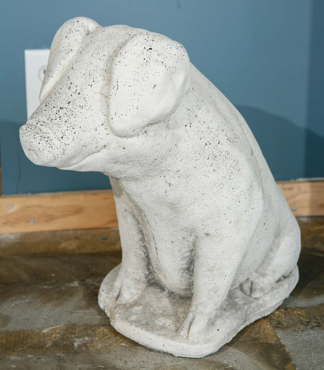 Charming stone pig for the garden.