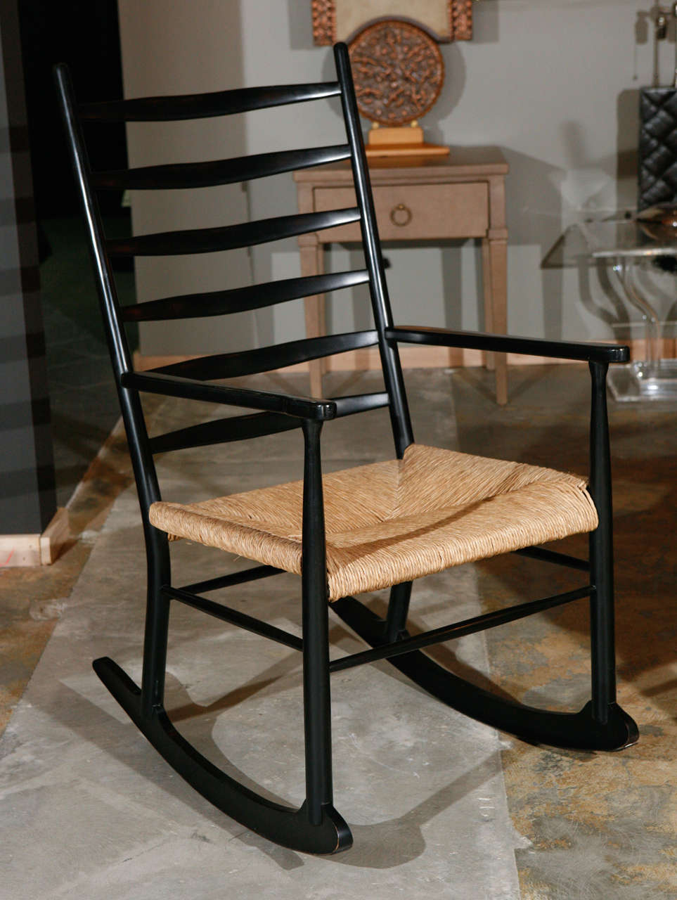 Rocking chair in manner of Gio Ponti, rush seat and black laquer finish.