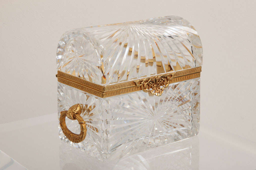 Beautifully cut and mounted cut crystal box with heavy doré bronze handles.