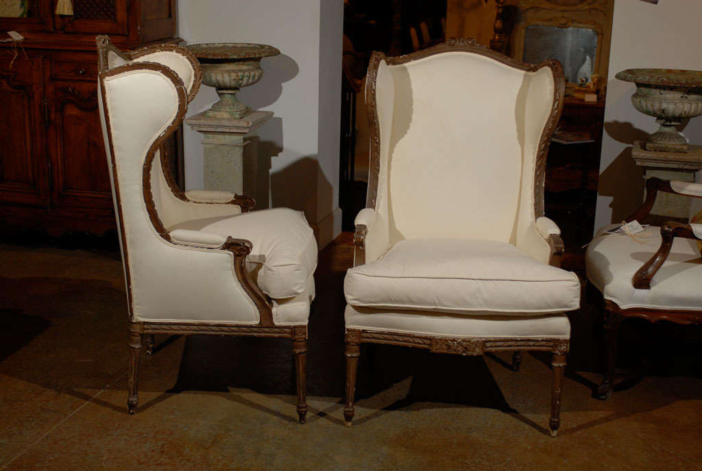 19th Century Pair of French Louis XVI Style 1870s Wingback Bergères Chairs with Upholstery