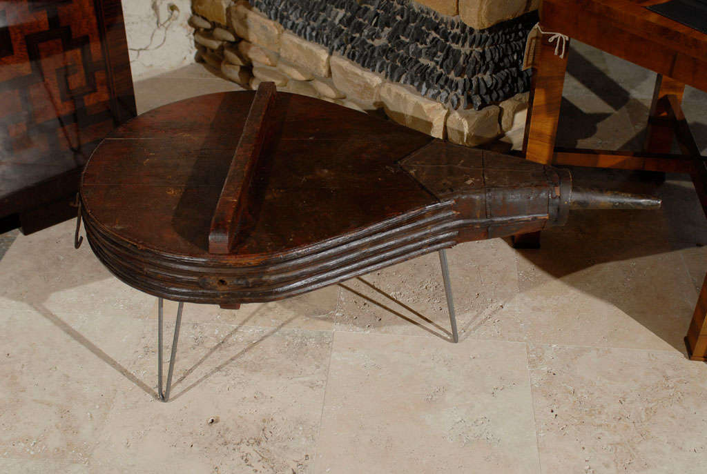 American Contemporary Bellows-Shaped Side Table Raised on Three Metal Looping Legs For Sale