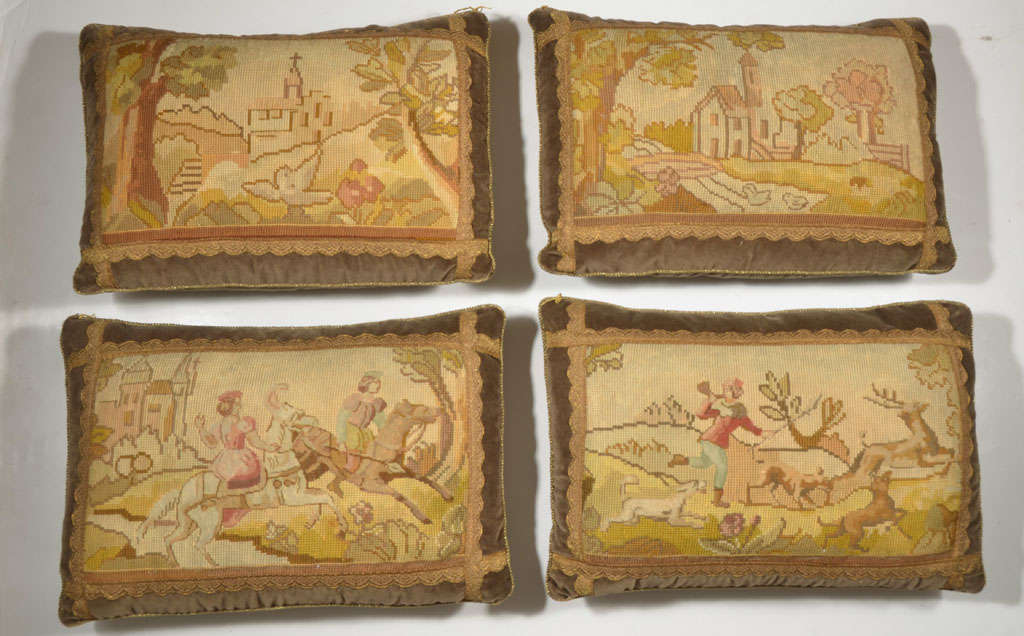 Cut from one Antique Needlepoint Tapestry, these panels depict story book-esque scenery. Nobility out hunting deer, with castles & town ships in the background. Trimmed in an antique galon ribbon & backed in a luscious chocolate velvet. Call for