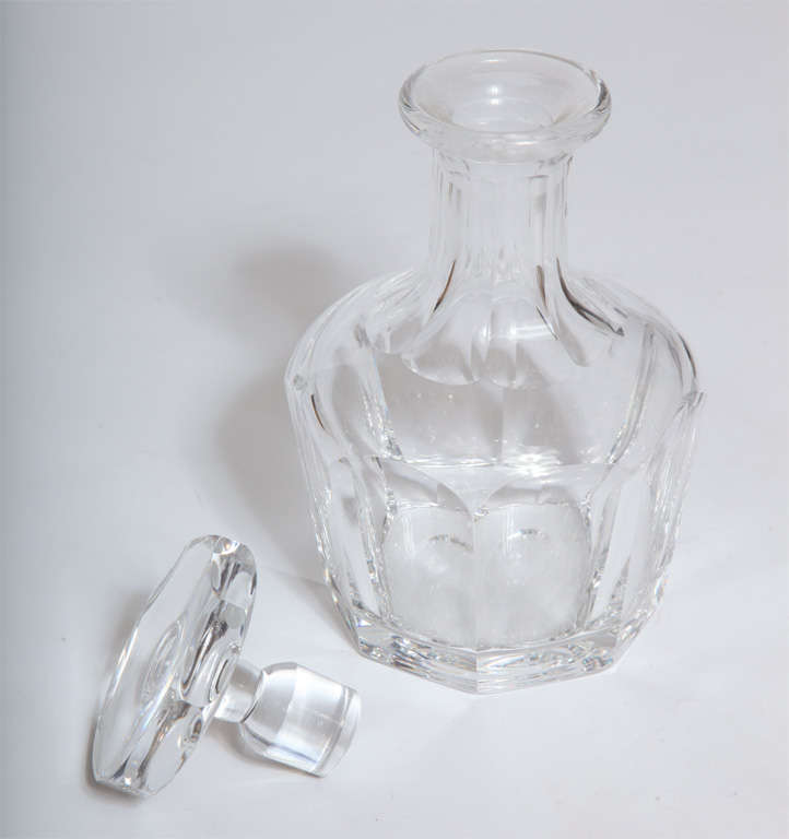 A stunning faceted crystal decanter by Orrefors from 1936. An elegant example of Scandinavian Deco design.