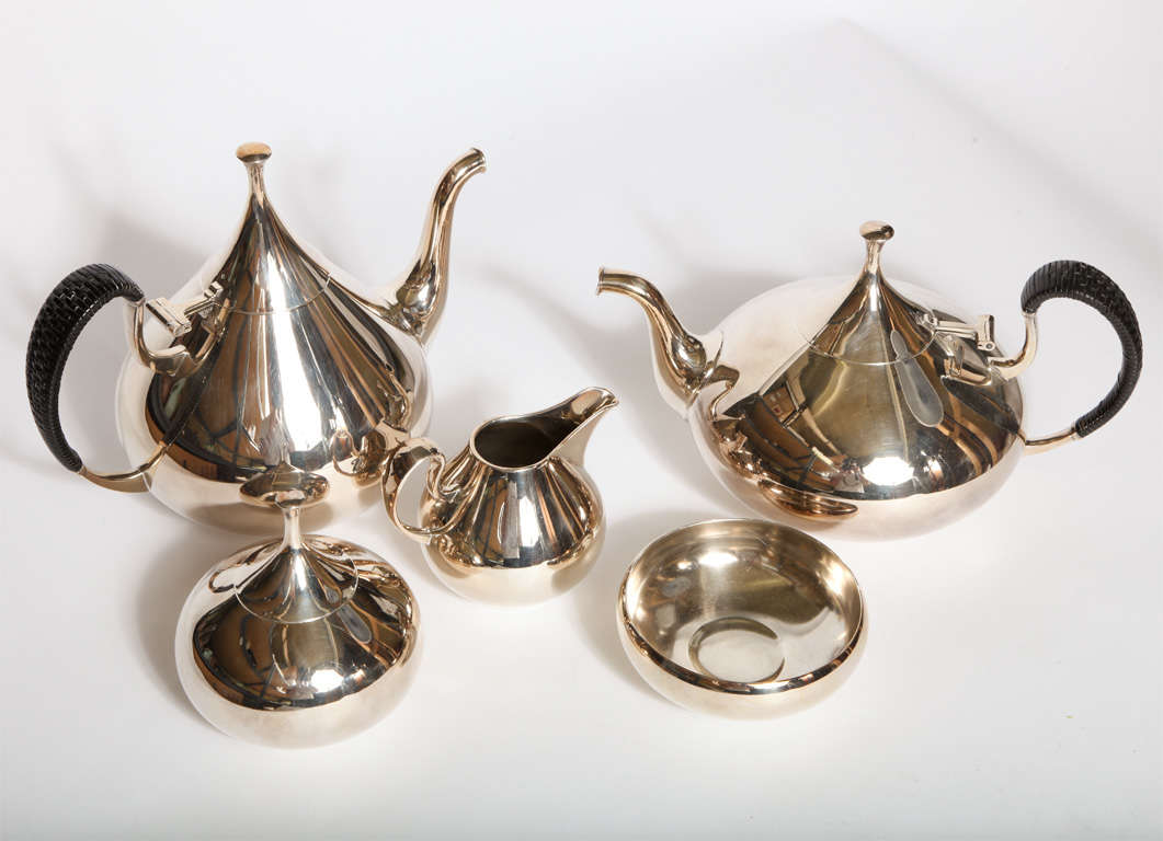 An elegant Mid-Century coffee and tea service set by John Pripp for Reed & Barton in 1961. Part of the 