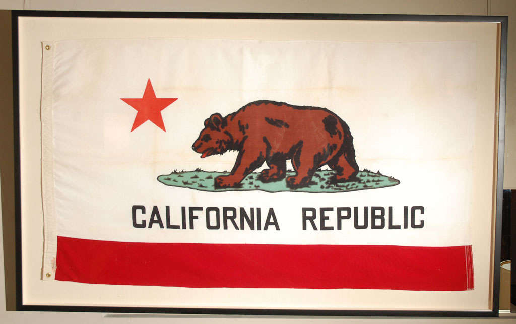 Absolutely incredible California State Flag from the 1940's. Fantastic weather to the material and newly framed in a linen lined shadow box style with black wood frame. A gorgeous statement piece!