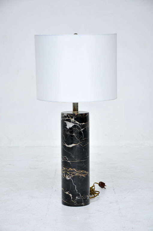 Cylindrical marble lamp by Nessen Studios.  Marble has beautiful gold, white, and beige grain running through.