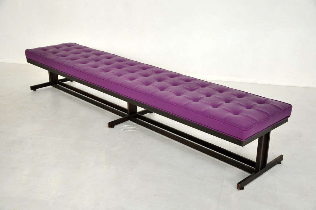 Long architectural bronze frame bench.  Newly upholstered in leather.