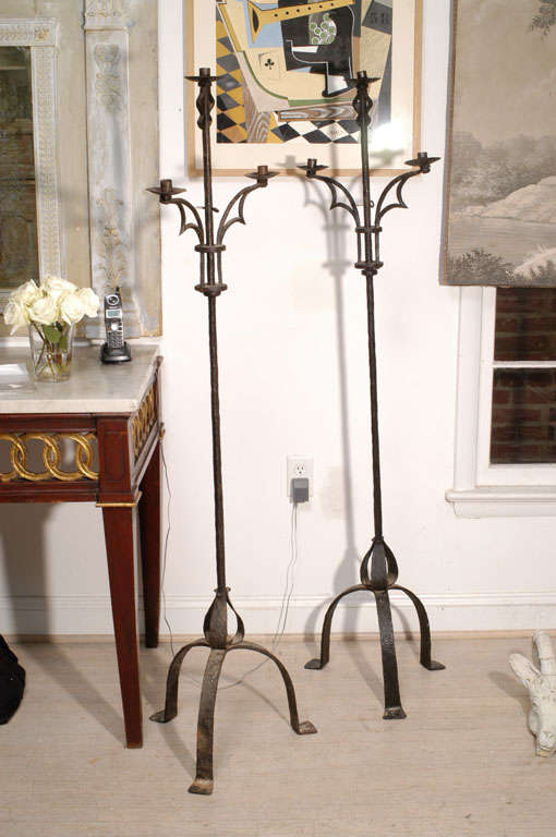 Pair of Cast Iron Floor Candelabras with ajus table candle holders