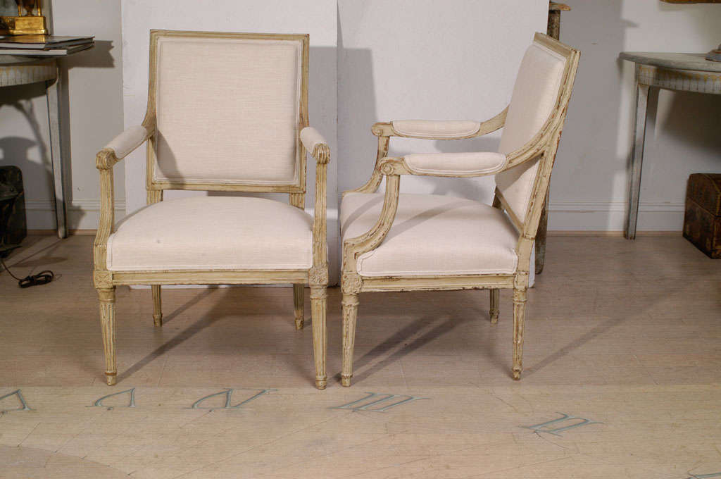 Pair of Painted Square Back Louis XVI Fauteuils.