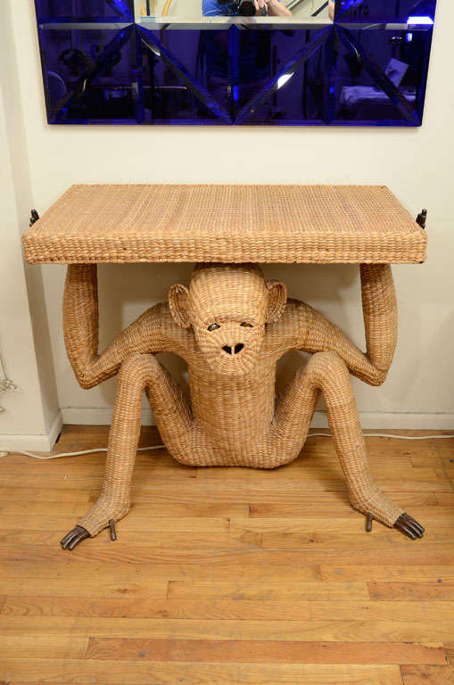 Rare wicker monkey console table with mixed metal detail by Mario Lopez Torres for Tzumindi. Bears original label.

View our complete collection at www.johnsalibello.com