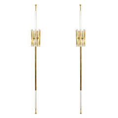 Pair of brass mounted pole floor lamps