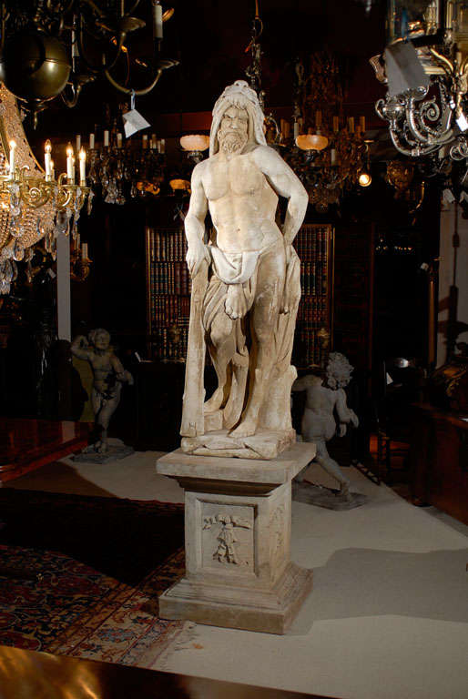 A very fine cast stone statue of Hercules wearing a lions pelt. On an original pedestal. Great quality.
The pedestal is 30