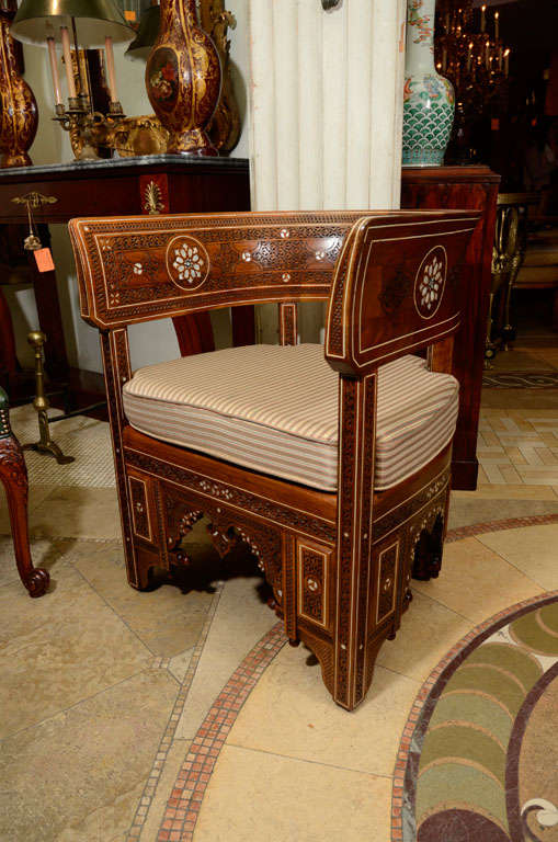 An unusual pair of Moroccan Mother of Pearl inlaid tub back Fauteuil's.