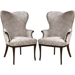 Pair of french heart shaped wing chairs in mahogany legs and detail