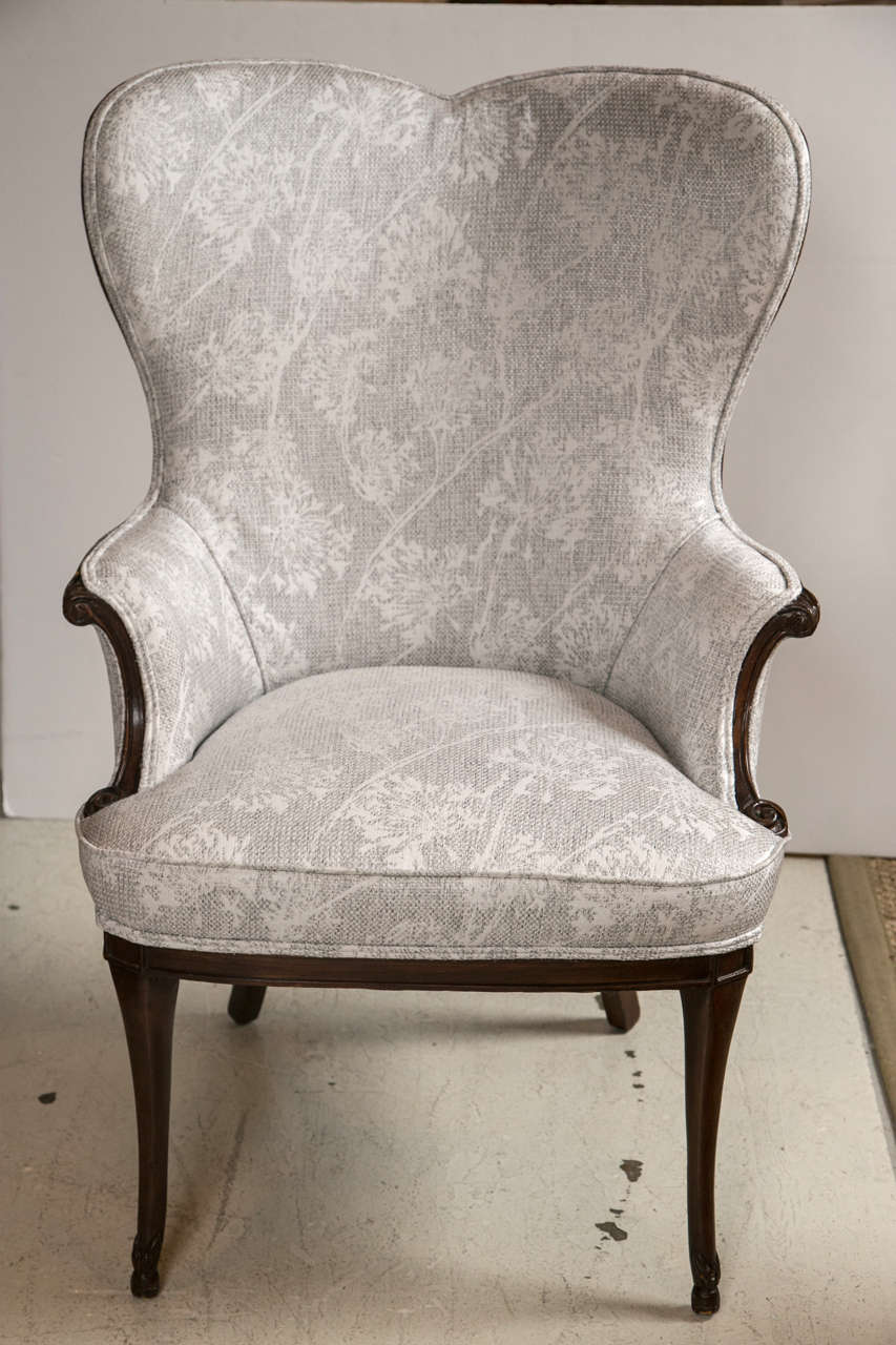 Pair of french heart shaped wing chairs in mahogany legs and detail at