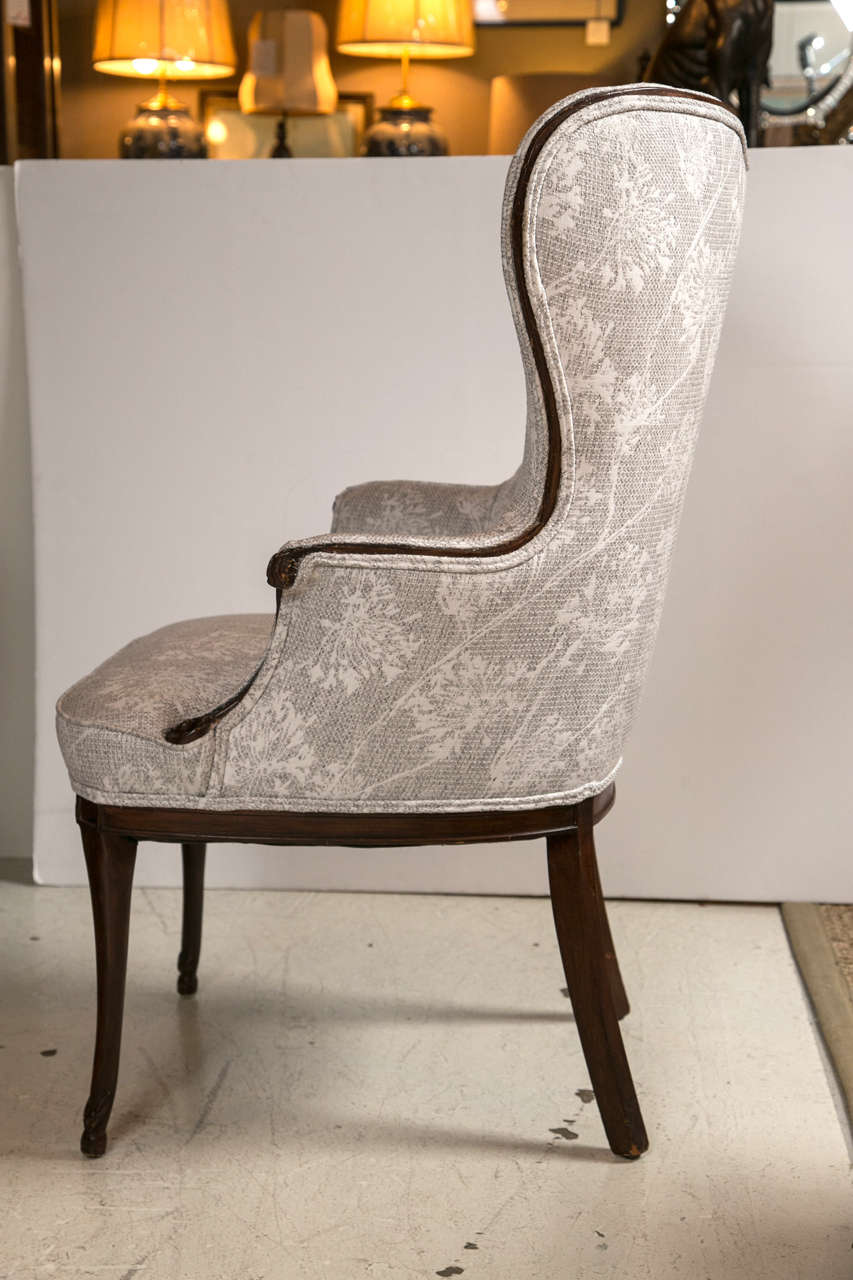 Pair of french heart shaped wing chairs in mahogany legs and detail at